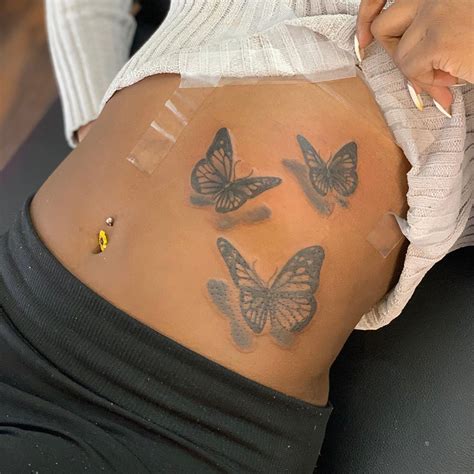 tattoos on brown skin|butterfly tattoos on brown skin.